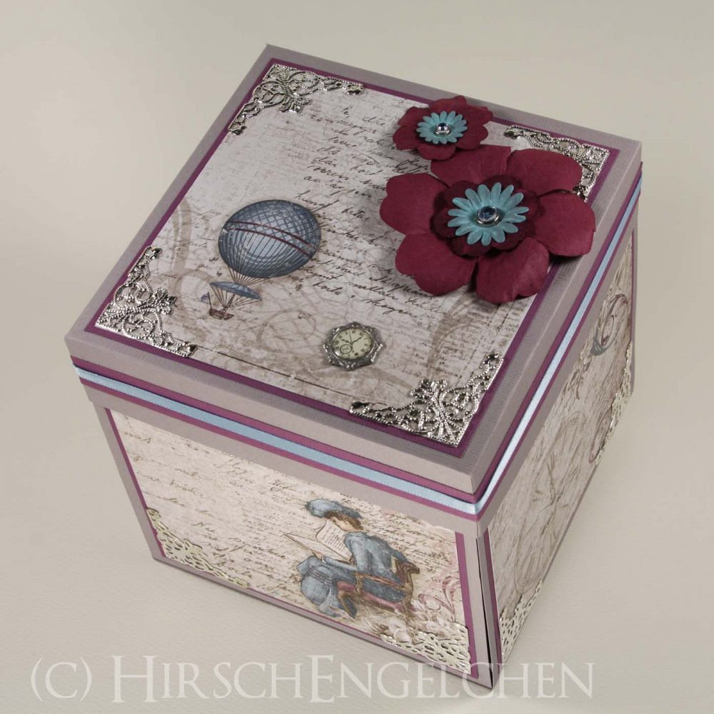 Nostalgische Explosionsbox mit leuchtender Torte